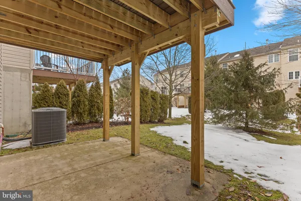 a view of a porch with furniture