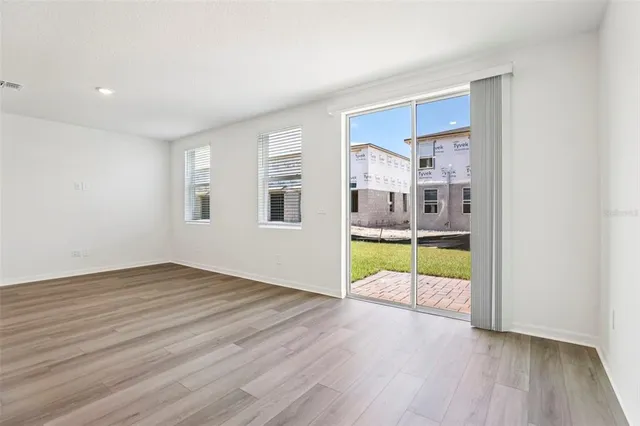 a kitchen with stainless steel appliances a sink stove and refrigerator