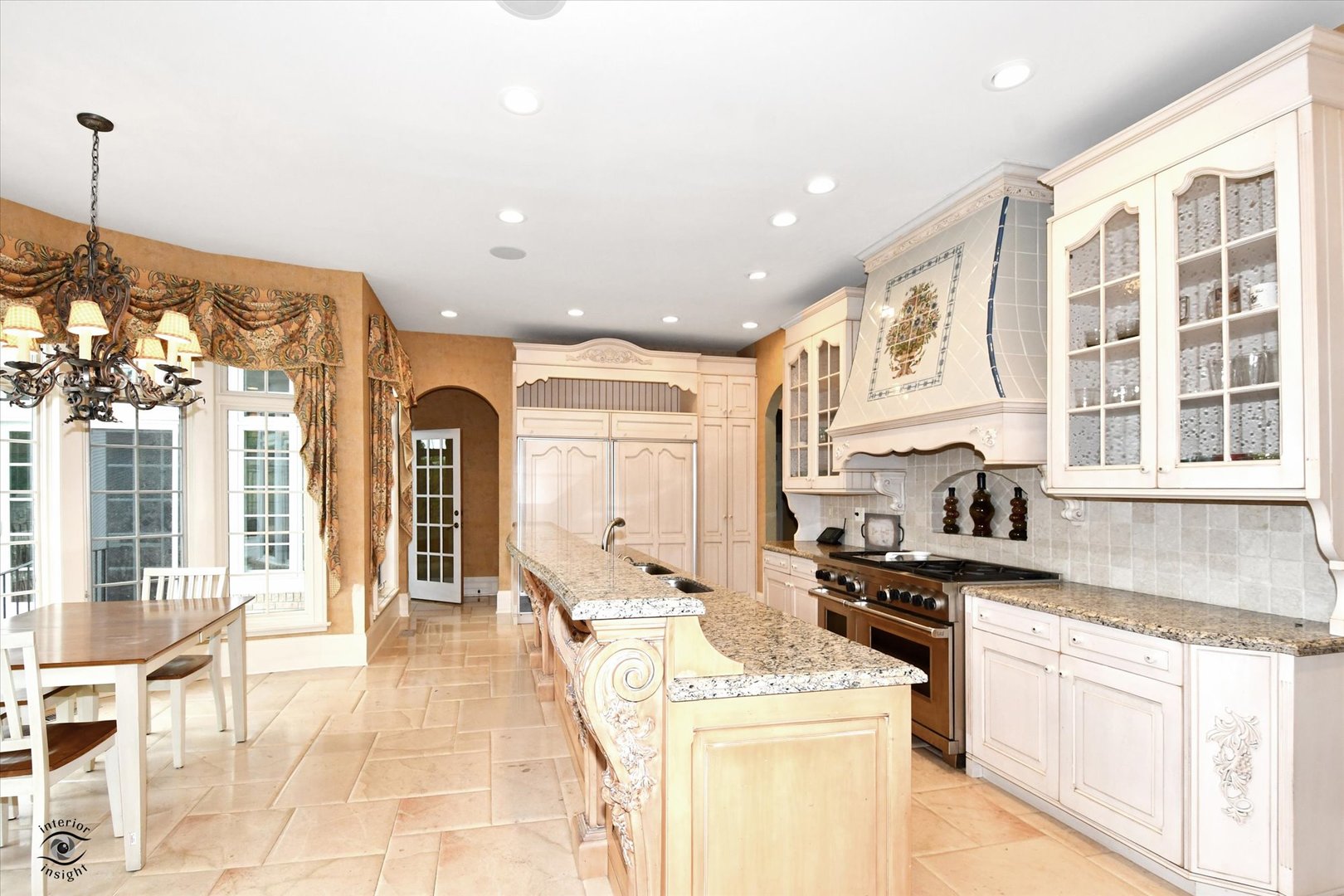 228 East Goodenow Road Beecher, IL 60401 - Photo 23 of 78 a kitchen with stainless steel appliances granite countertop a stove and a sink