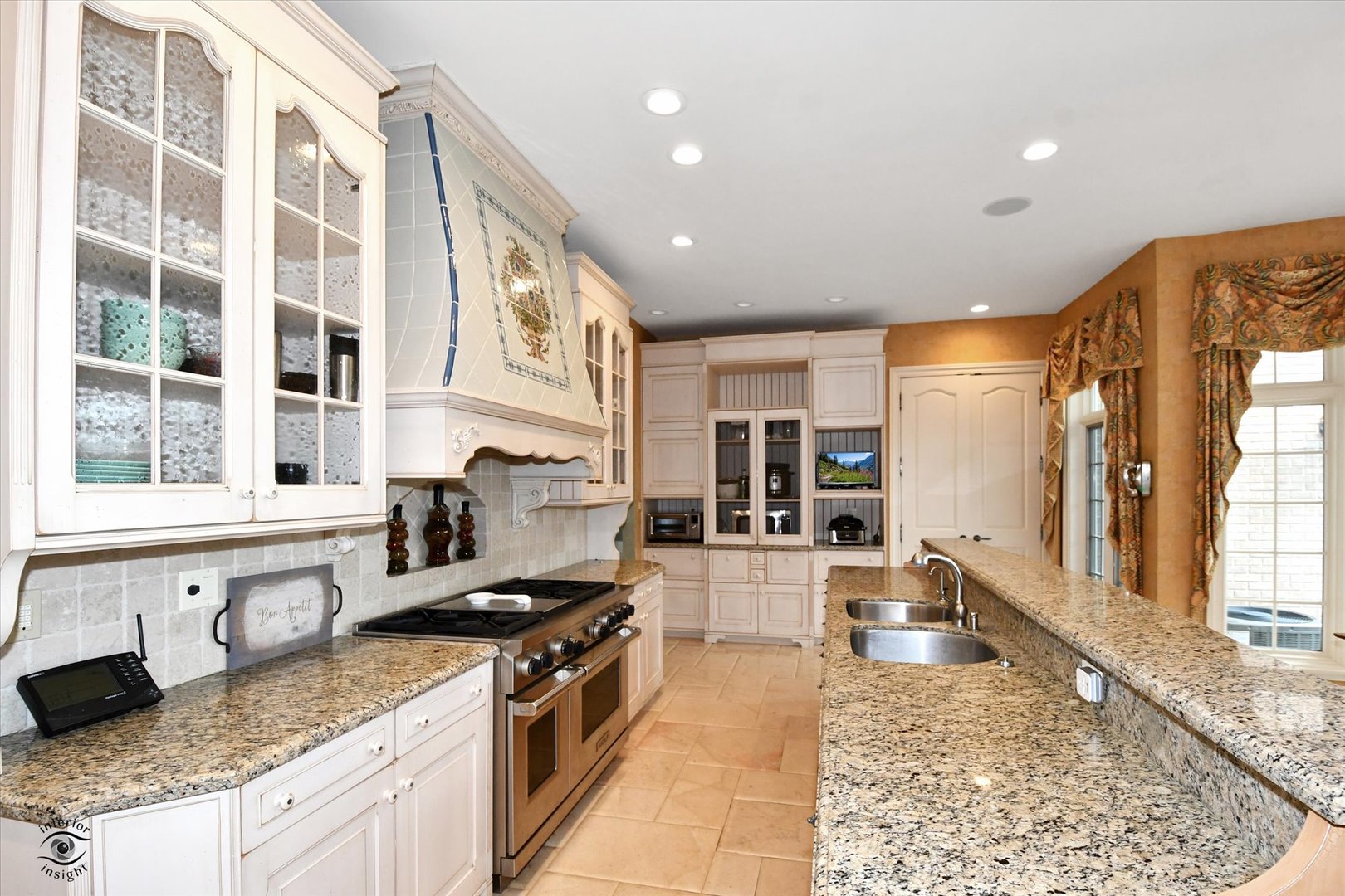 228 East Goodenow Road Beecher, IL 60401 - Photo 26 of 78 a kitchen with stainless steel appliances granite countertop a stove and a sink
