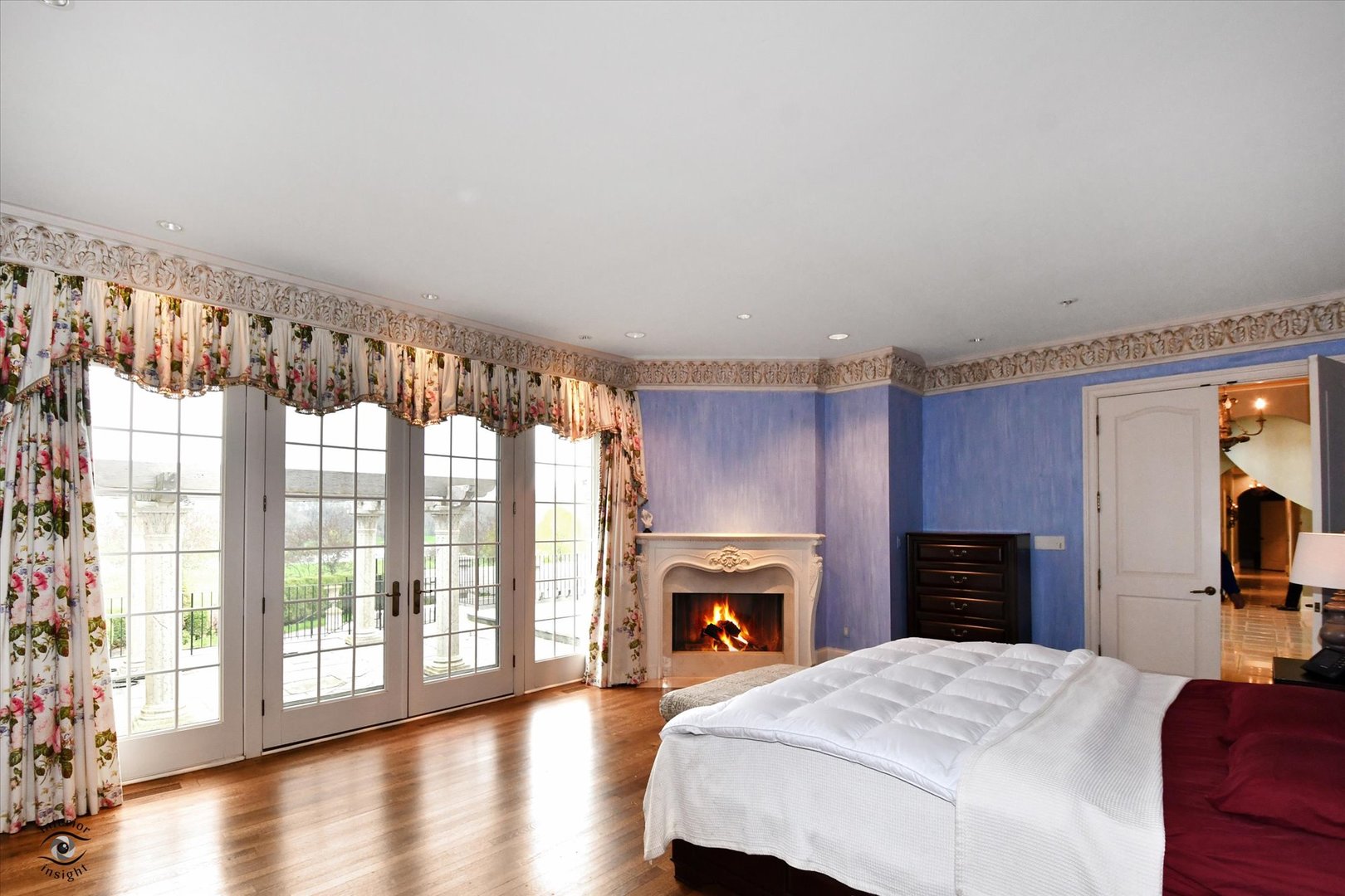 228 East Goodenow Road Beecher, IL 60401 - Photo 40 of 78 a spacious bedroom with a bed and a fireplace