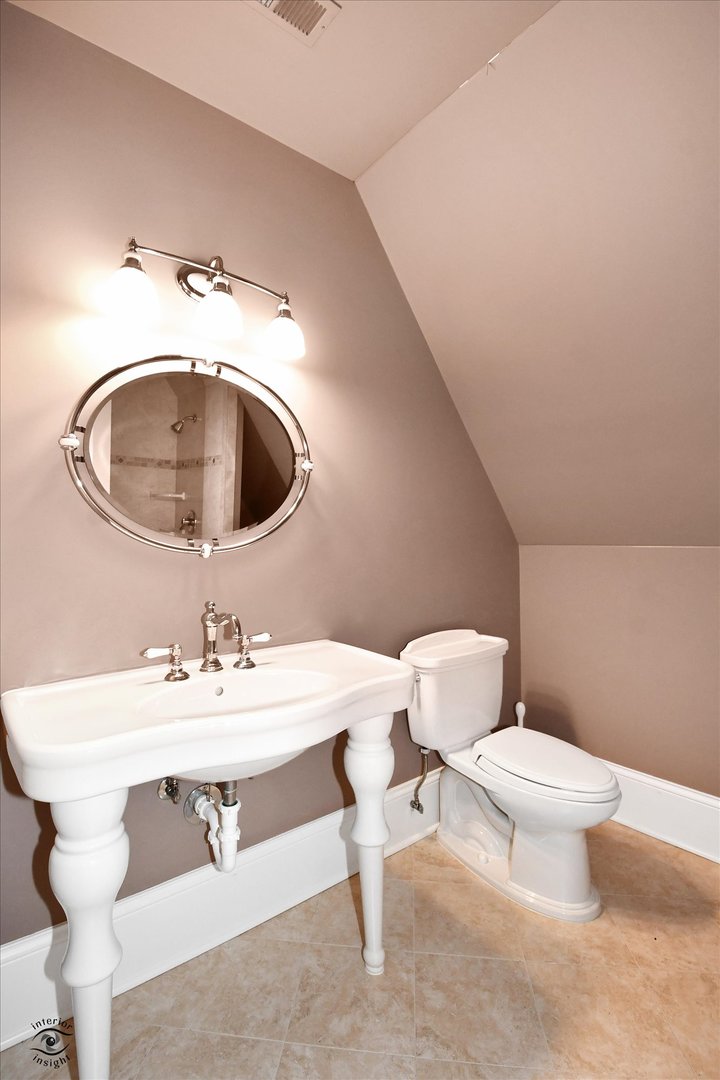 228 East Goodenow Road Beecher, IL 60401 - Photo 55 of 78 a bathroom with a sink and a mirror