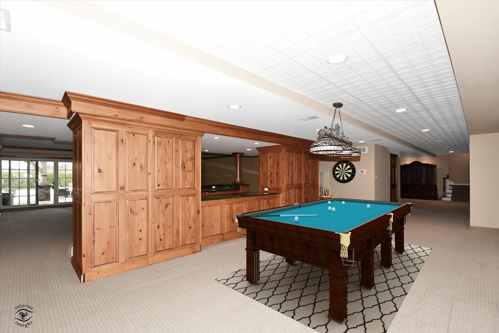 228 East Goodenow Road Beecher, IL 60401 - Photo 61 of 78 a living room with furniture a flat screen tv and a table