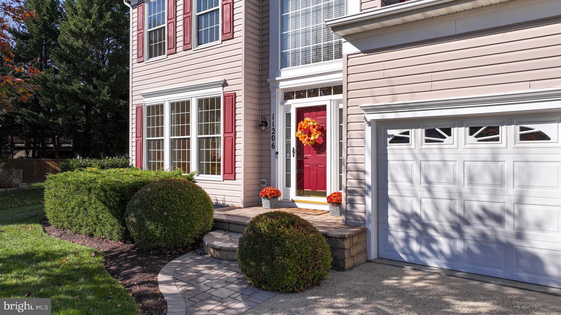 11206 Poplar Grove Court Laurel, MD 20708 - Photo 2 of 67 a view of a front of a house with large windows