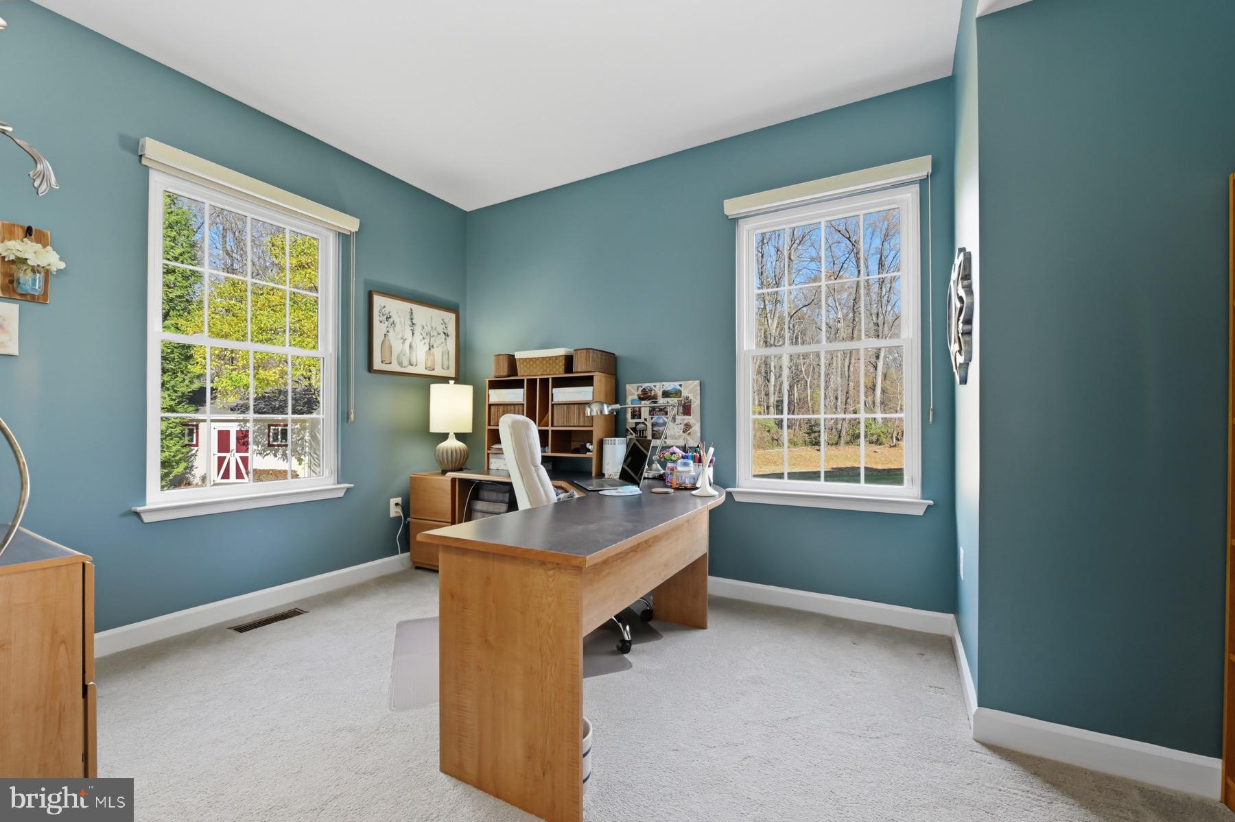 11206 Poplar Grove Court Laurel, MD 20708 - Photo 21 of 67 a view of a workspace with furniture and a window