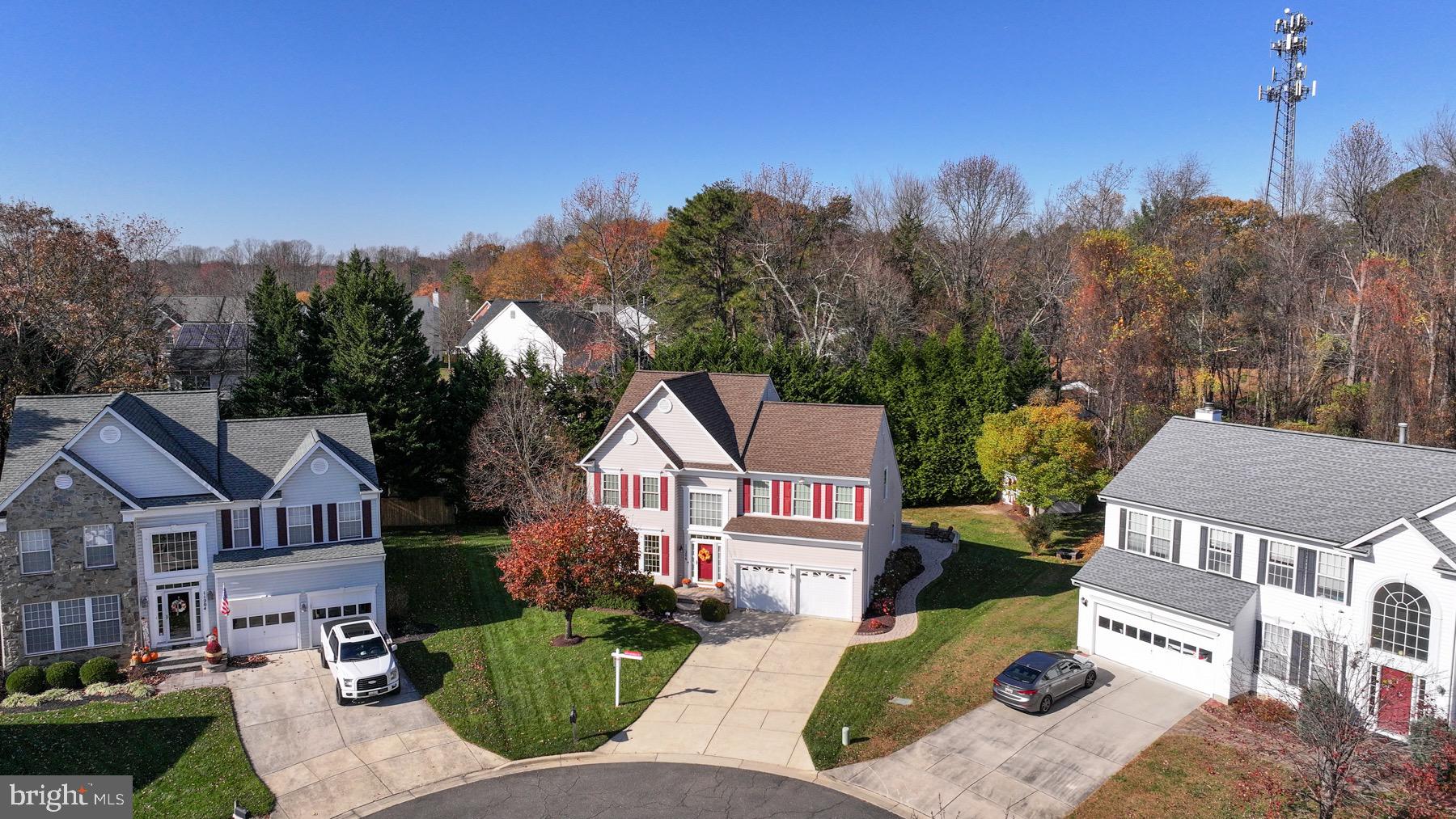 11206 Poplar Grove Court Laurel, MD 20708 - Photo 3 of 67 a view of multiple houses with a street