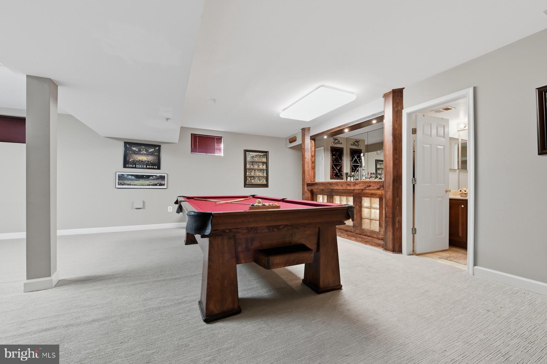 11206 Poplar Grove Court Laurel, MD 20708 - Photo 37 of 67 a room with furniture a piano and a flat screen tv