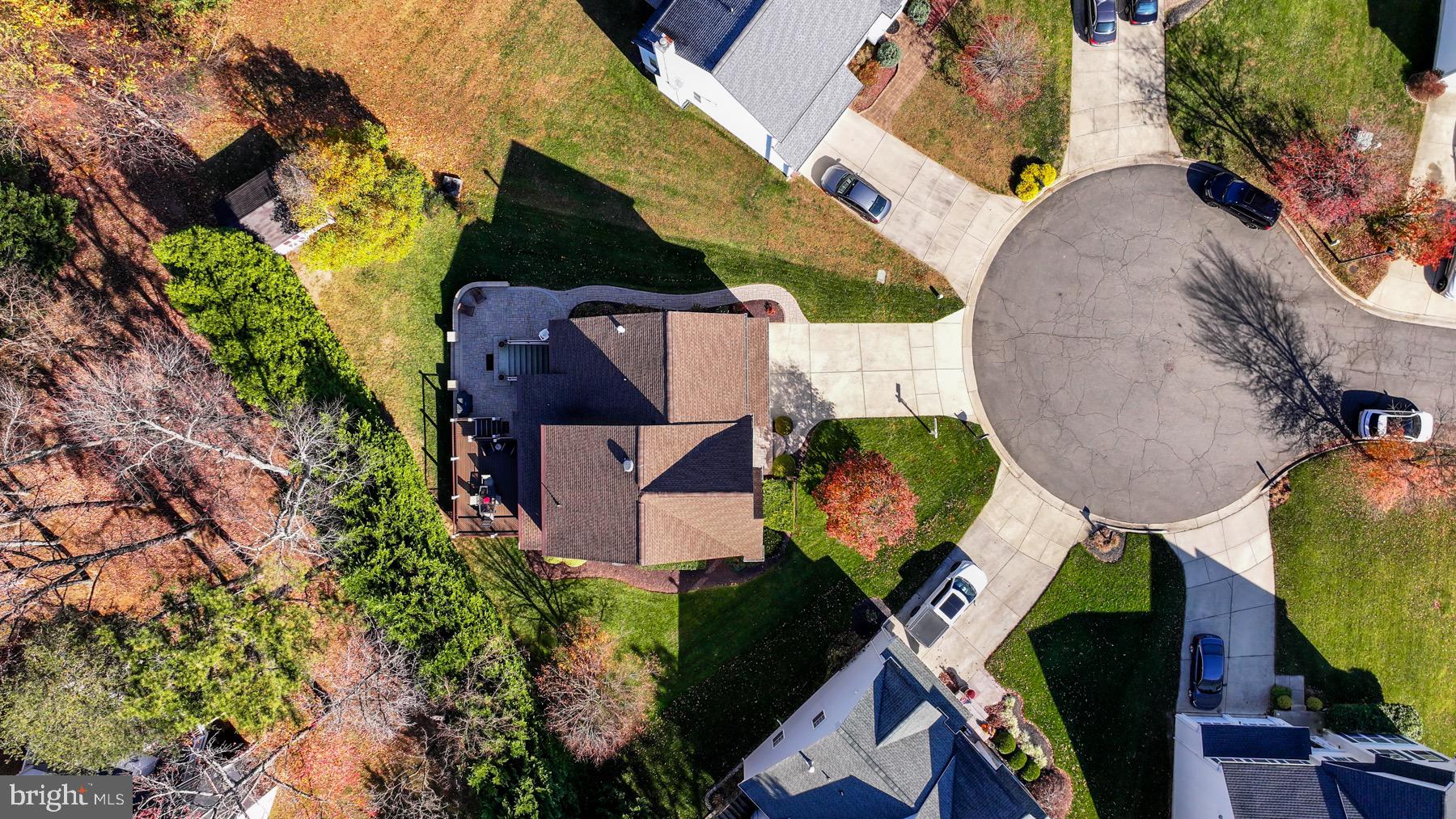 11206 Poplar Grove Court Laurel, MD 20708 - Photo 4 of 67 an aerial view of a house with a yard and a fountain