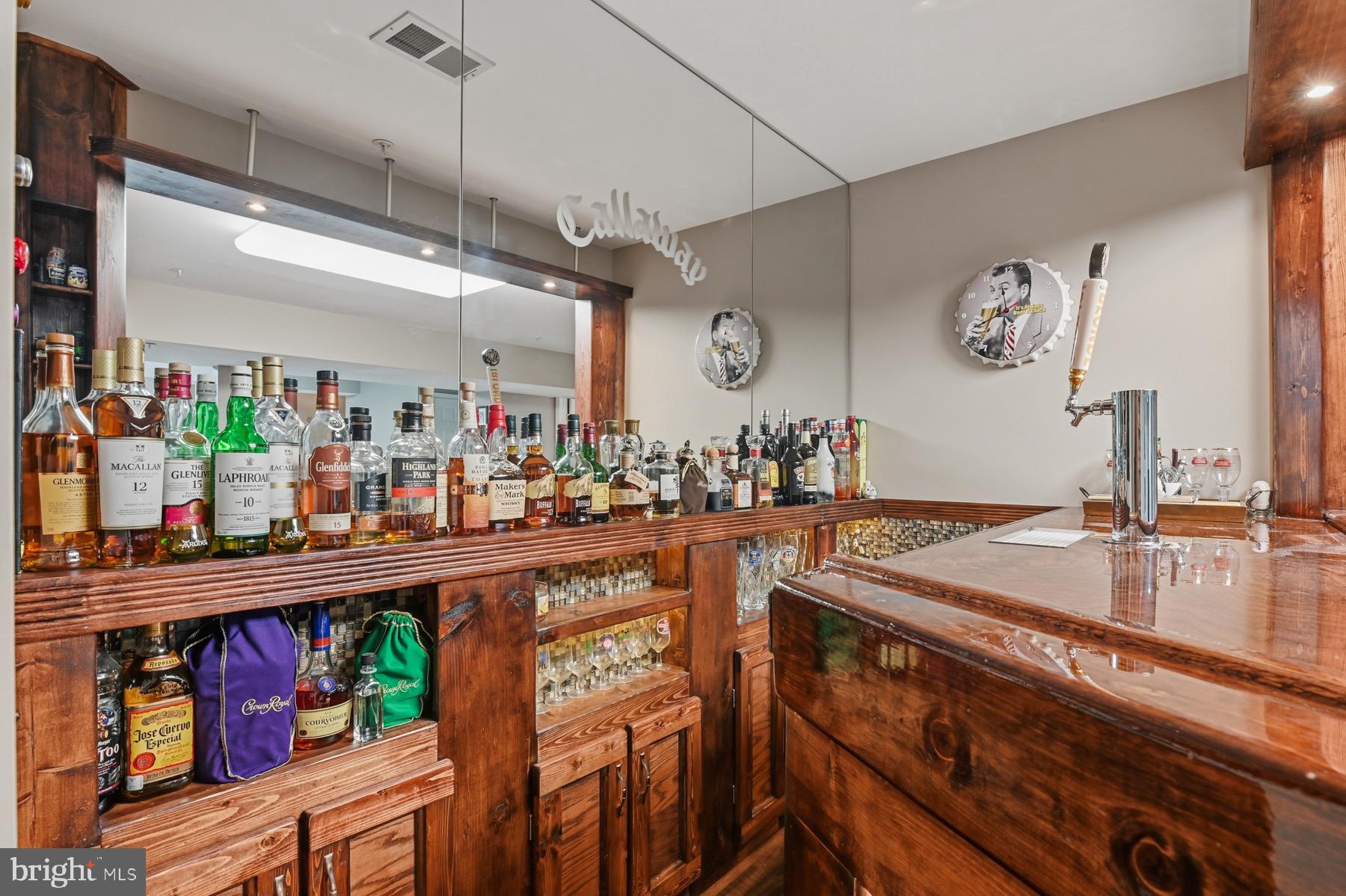 11206 Poplar Grove Court Laurel, MD 20708 - Photo 44 of 67 a kitchen with lots of counter top space and furniture