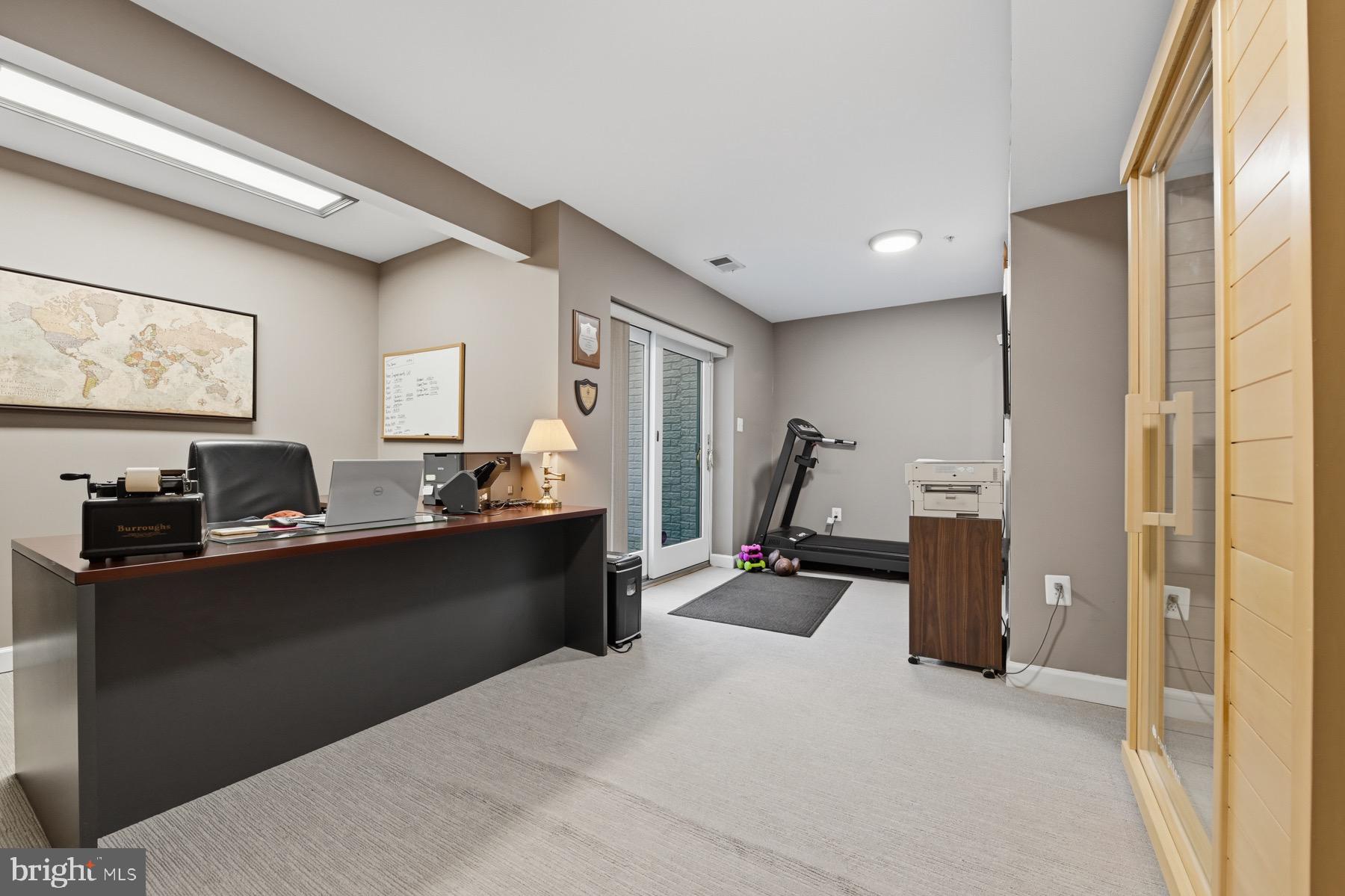 11206 Poplar Grove Court Laurel, MD 20708 - Photo 45 of 67 a view of a workspace with furniture and a window