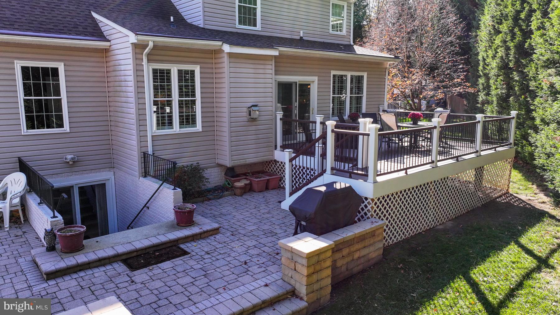 11206 Poplar Grove Court Laurel, MD 20708 - Photo 49 of 67 a view of a deck with couches next to a yard