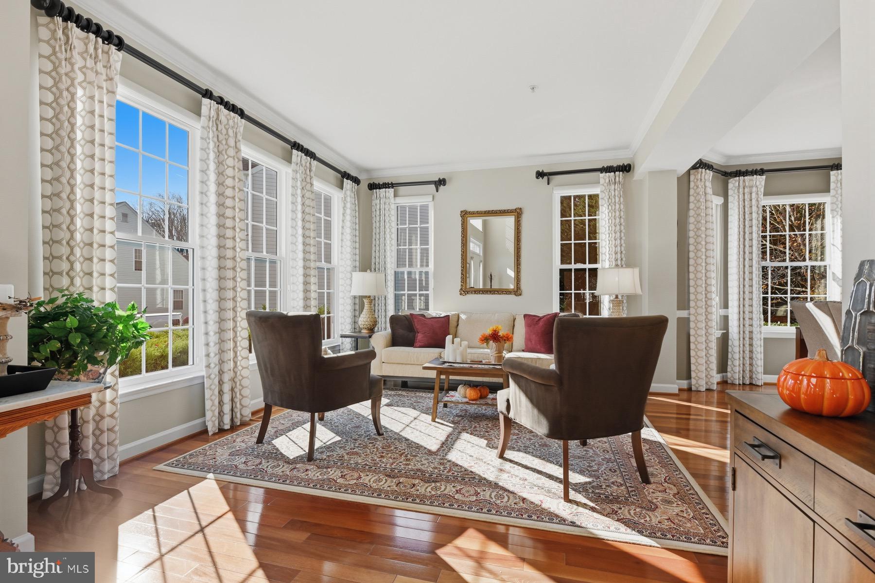 11206 Poplar Grove Court Laurel, MD 20708 - Photo 8 of 67 a living room with furniture and wooden floor