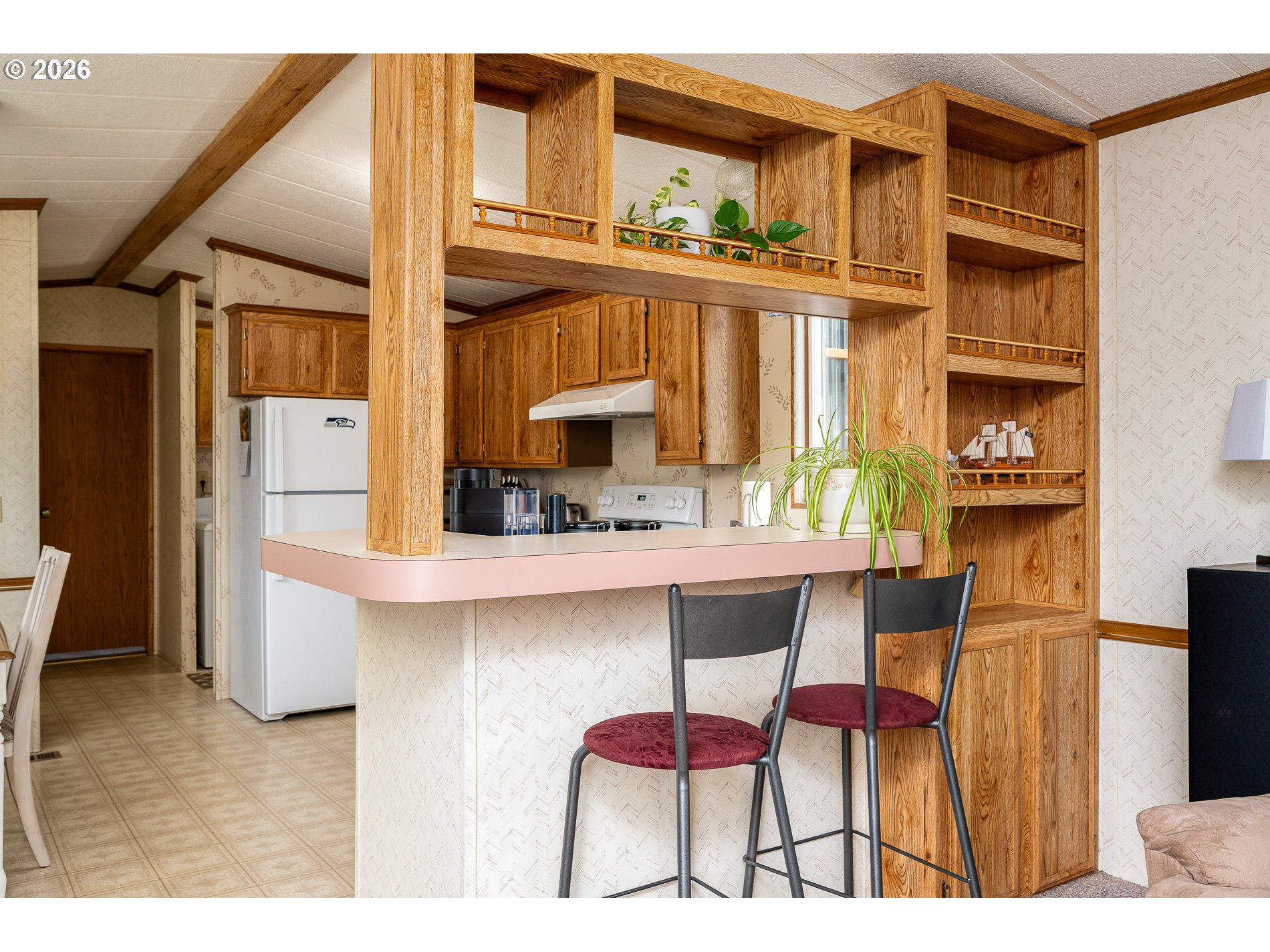 648 South Easy Street Rockaway Beach, OR 97136 - Photo 33 of 35 a dining room with furniture and wooden floor