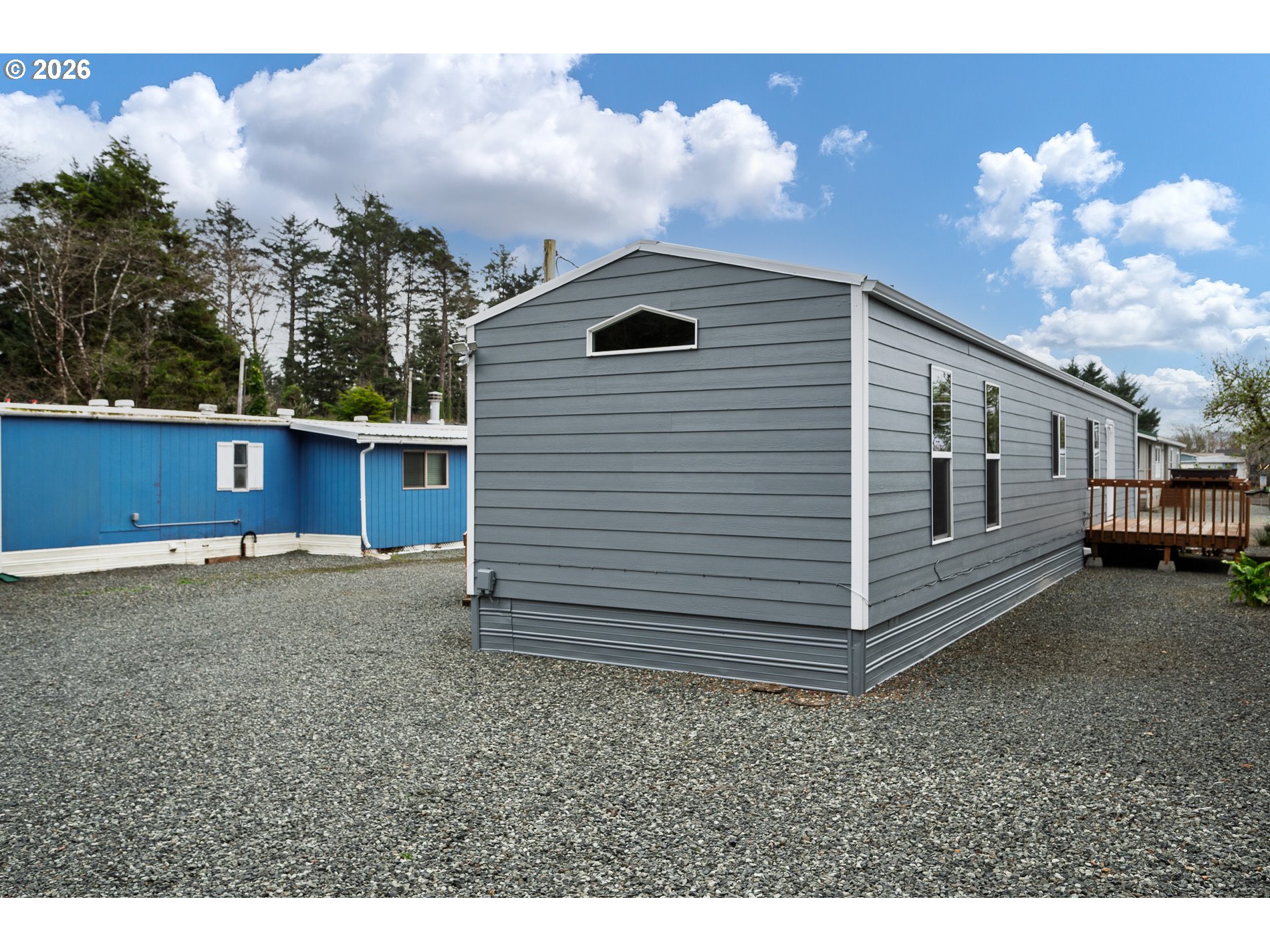 648 South Easy Street Rockaway Beach, OR 97136 - Photo 6 of 35 a view of a house with a backyard
