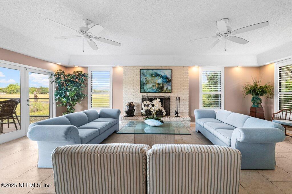 2010 Shadow Lane Neptune Beach, FL 32266 - Photo 12 of 61 a living room with furniture and a large window
