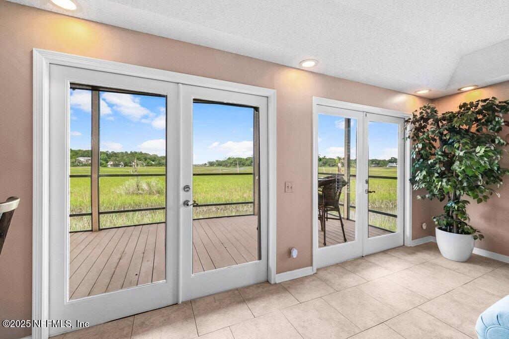 2010 Shadow Lane Neptune Beach, FL 32266 - Photo 17 of 61 a view of an entryway with garden