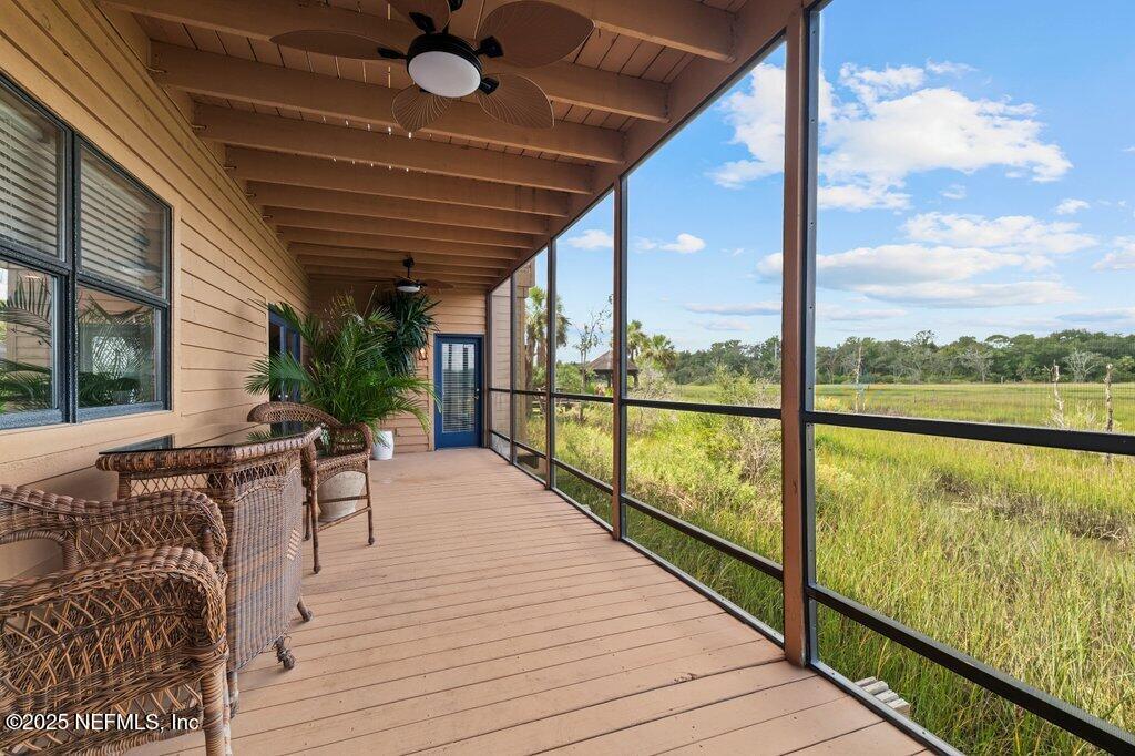 2010 Shadow Lane Neptune Beach, FL 32266 - Photo 20 of 61 a view of balcony with wooden floor and seating space