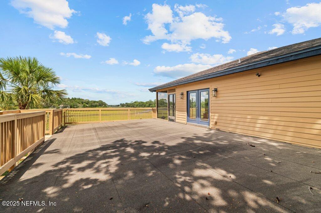 2010 Shadow Lane Neptune Beach, FL 32266 - Photo 43 of 61 a view of an ocean with a big yard