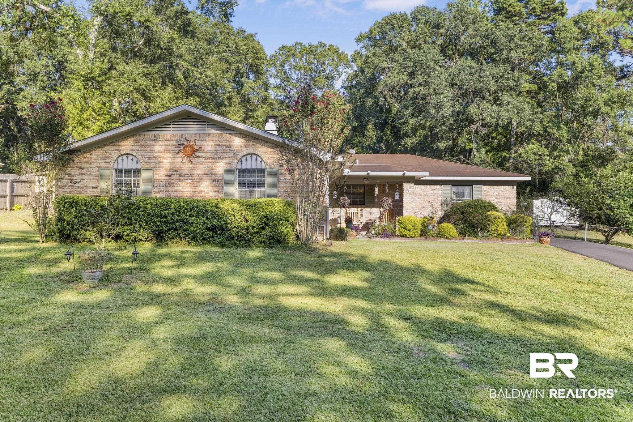 2573 E Road Mobile, AL 36693 - Photo 30 of 45 Ranch-style home with brick siding and a chimney
