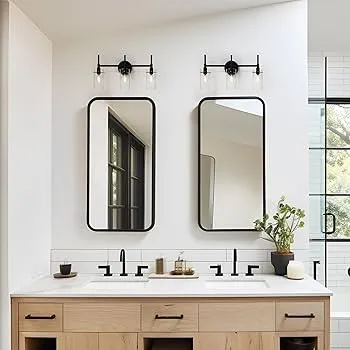 a bathroom with double vanity sinks and a mirror