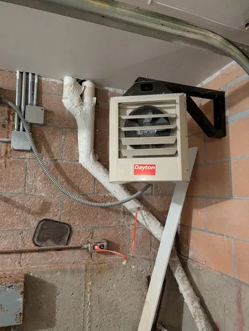 a kitchen with stainless steel appliances a refrigerator and a stove