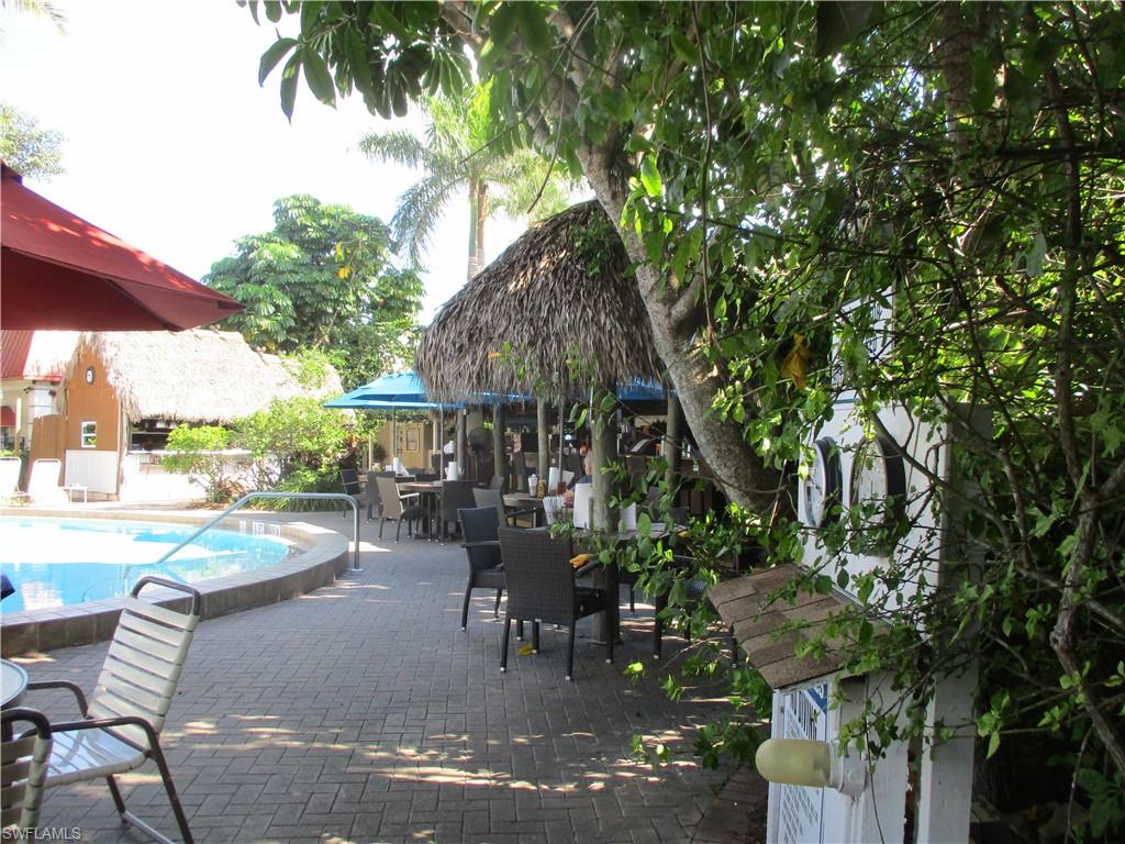 2555 9th Street North, Unit 131 Naples, FL 34103 - Photo 17 of 17 a view of outdoor space yard and patio