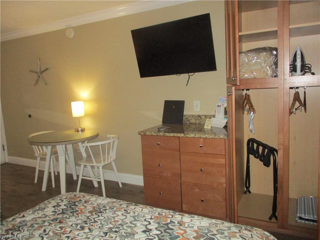 2555 9th Street North, Unit 131 Naples, FL 34103 - Photo 7 of 17 a view of a workspace with furniture