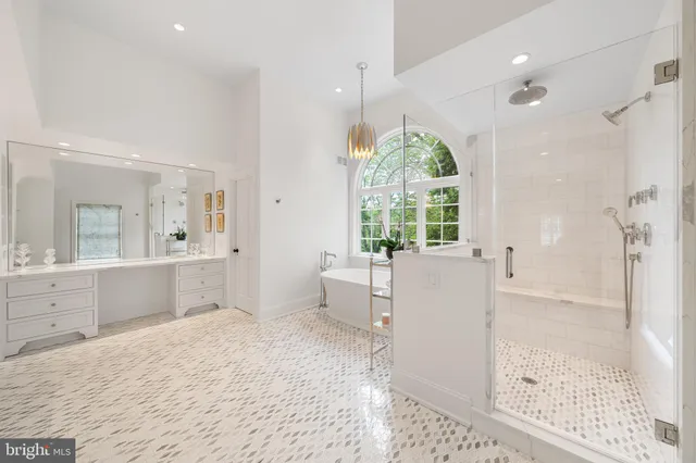a view of a hallway with wooden shelves