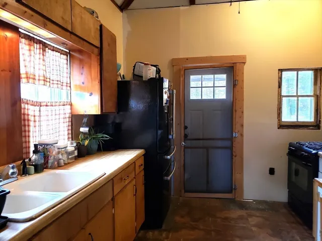 a bathroom with a sink and a large mirror