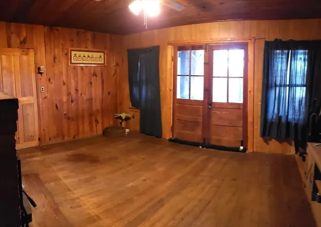 an empty room with windows