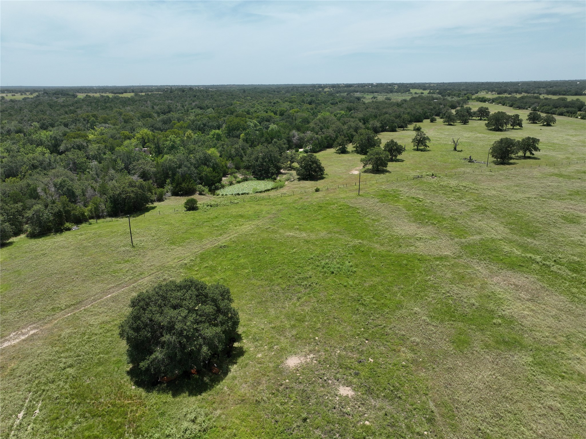 127 Rd Ledbetter Tx 78946 Road Ledbetter, TX 78946 - Photo 4 of 11 a view of a lake with a city