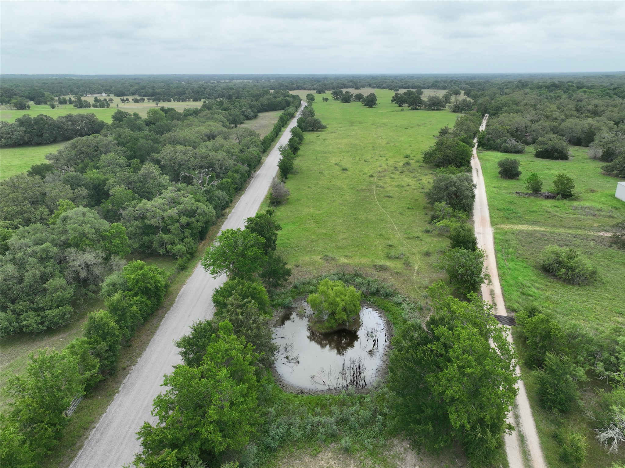 127 Rd Ledbetter Tx 78946 Road Ledbetter, TX 78946 - Photo 8 of 11 an aerial view of a houses with a yard