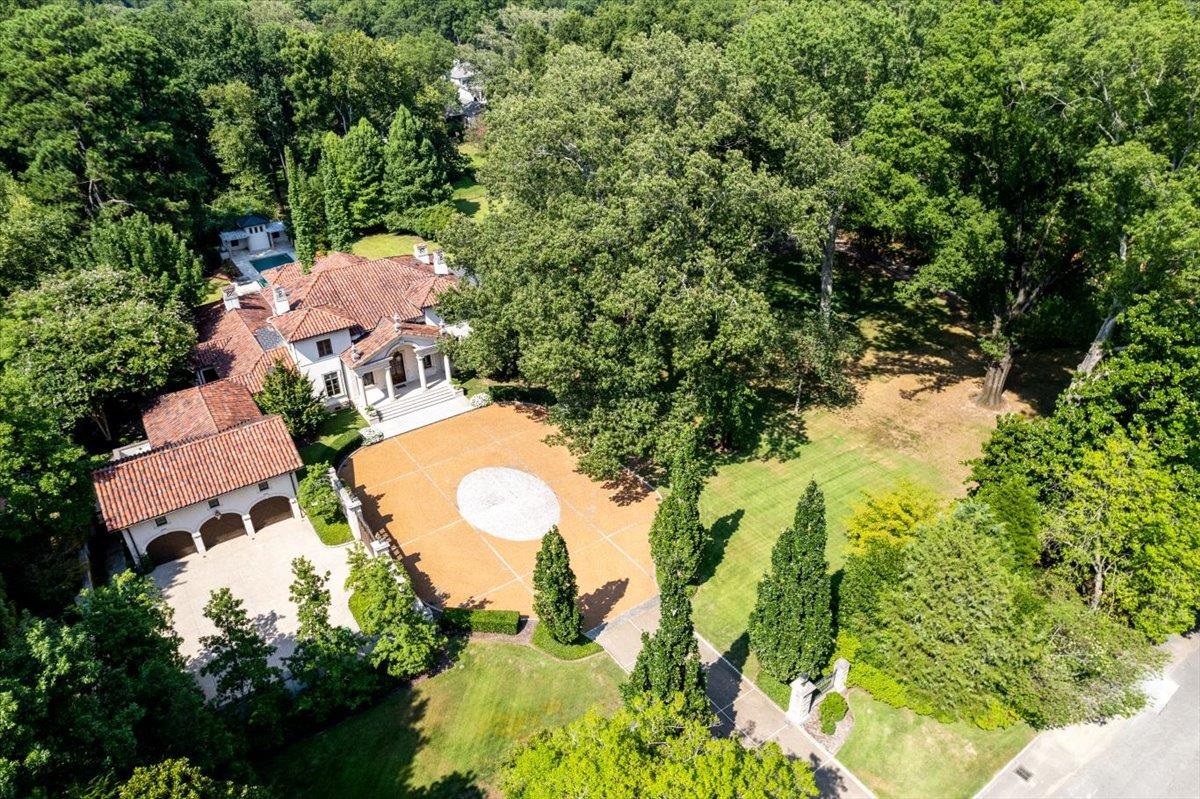 4143 Gwynne Road Memphis, TN 38117 - Photo 22 of 29 Aerial view of property and surrounding area with a heavily wooded area