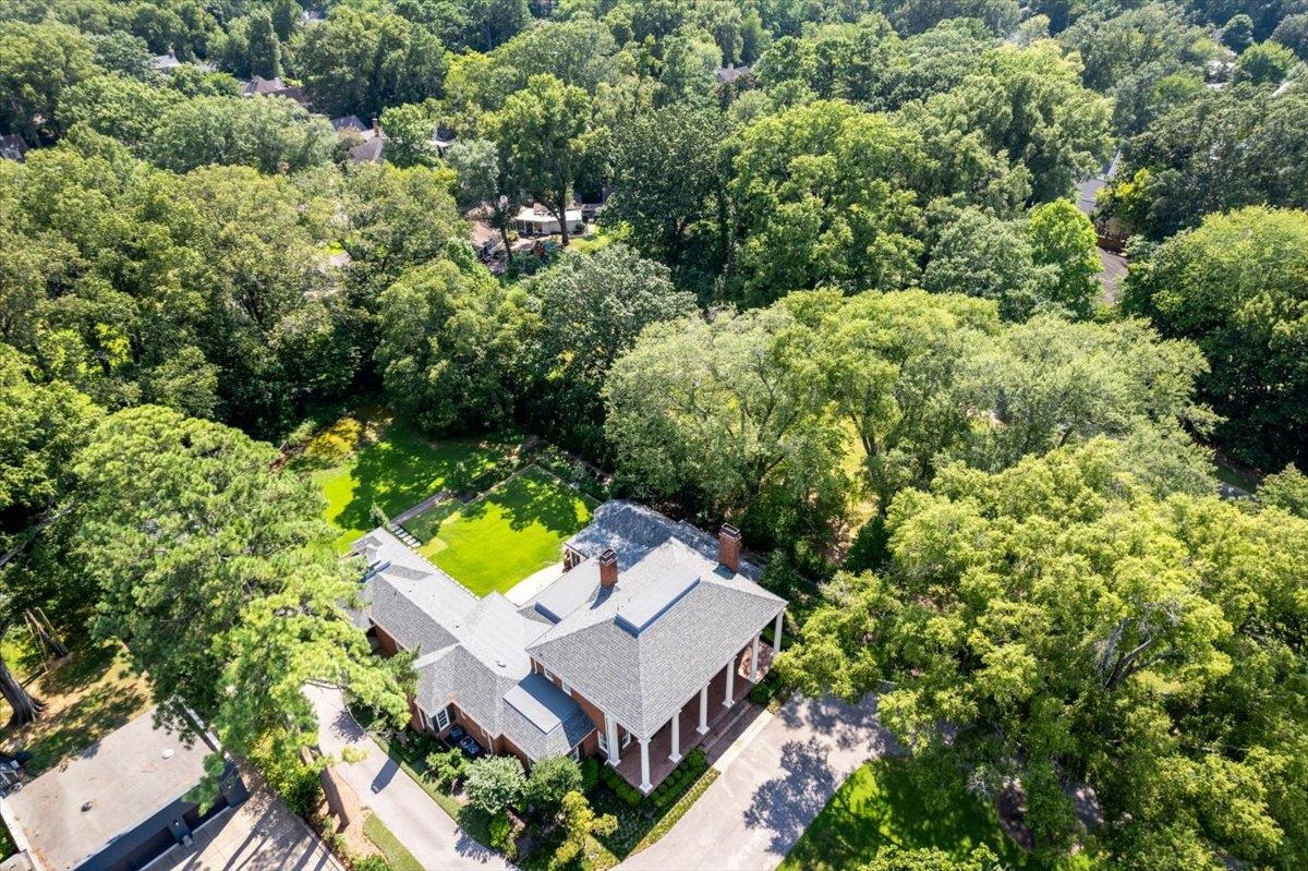 4143 Gwynne Road Memphis, TN 38117 - Photo 23 of 29 Aerial view of property and surrounding area featuring a forest