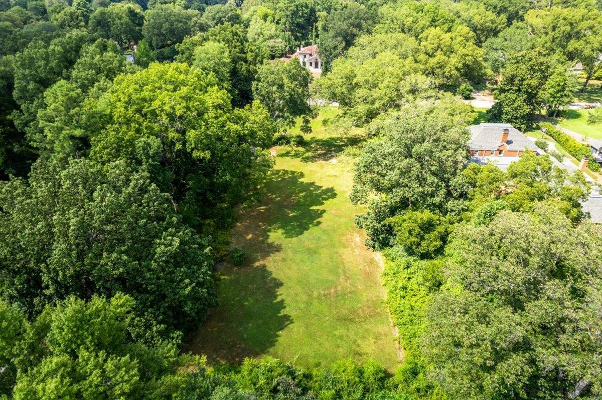 4143 Gwynne Road Memphis, TN 38117 - Photo 7 of 29 Drone / aerial view of a heavily wooded area