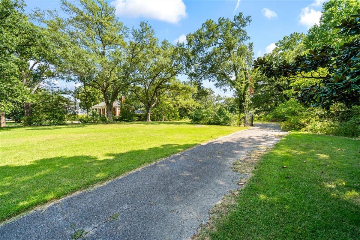4143 Gwynne Road Memphis, TN 38117 - Photo 10 of 29 View of community featuring a lawn and driveway