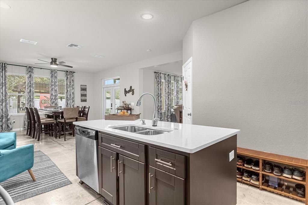 5781 Southwest 39th Street Ocala, FL 34474 - Photo 18 of 45 a view of dining table chairs and window