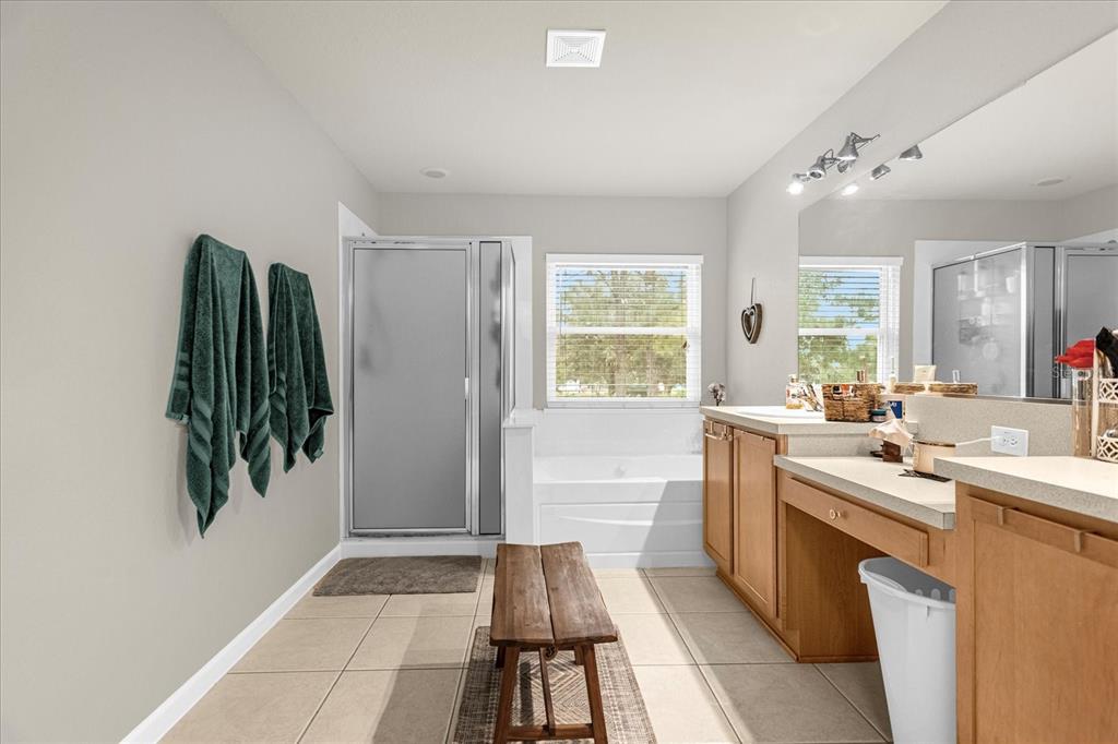 5781 Southwest 39th Street Ocala, FL 34474 - Photo 28 of 45 a kitchen with a sink and cabinets