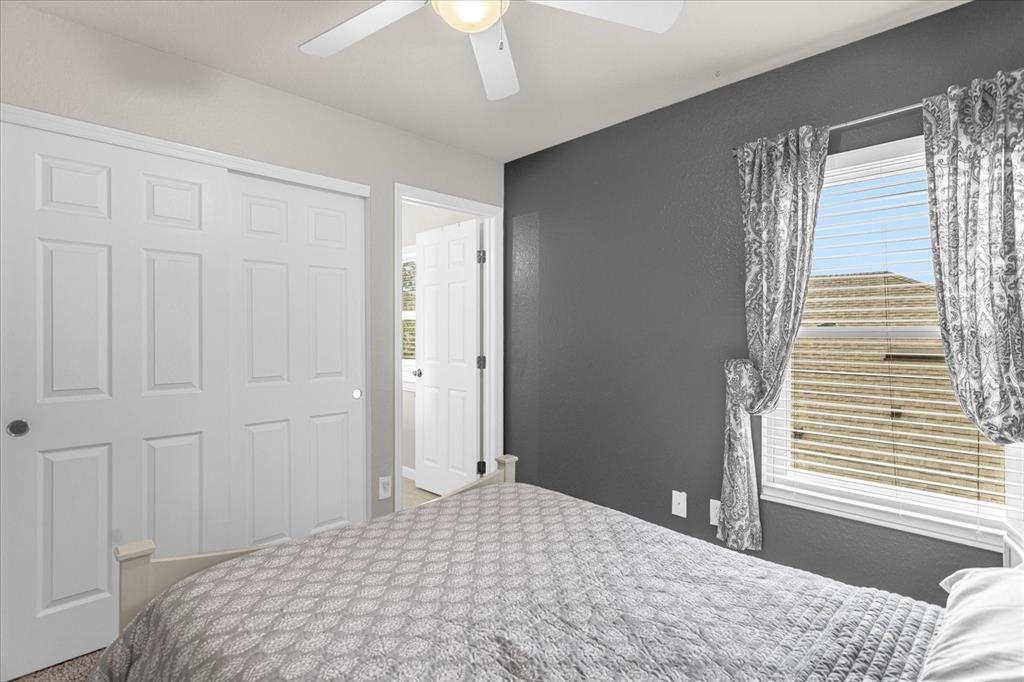 5781 Southwest 39th Street Ocala, FL 34474 - Photo 31 of 45 a bedroom with a bed and a window