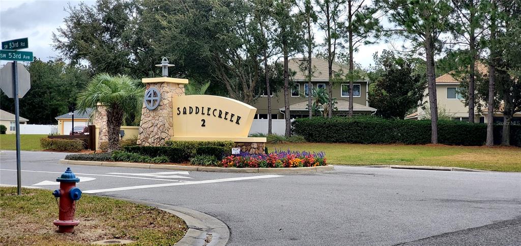 5781 Southwest 39th Street Ocala, FL 34474 - Photo 37 of 45 a front view of a house with garden