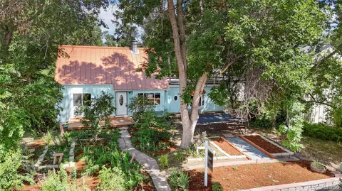 a view of swimming pool with a patio