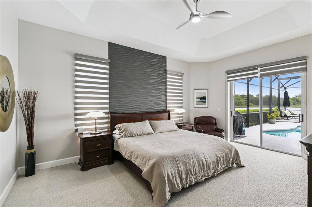 1652 Cherry Ridge Drive Lake Mary, FL 32746 - Photo 20 of 62 a bedroom with a bed and a large window