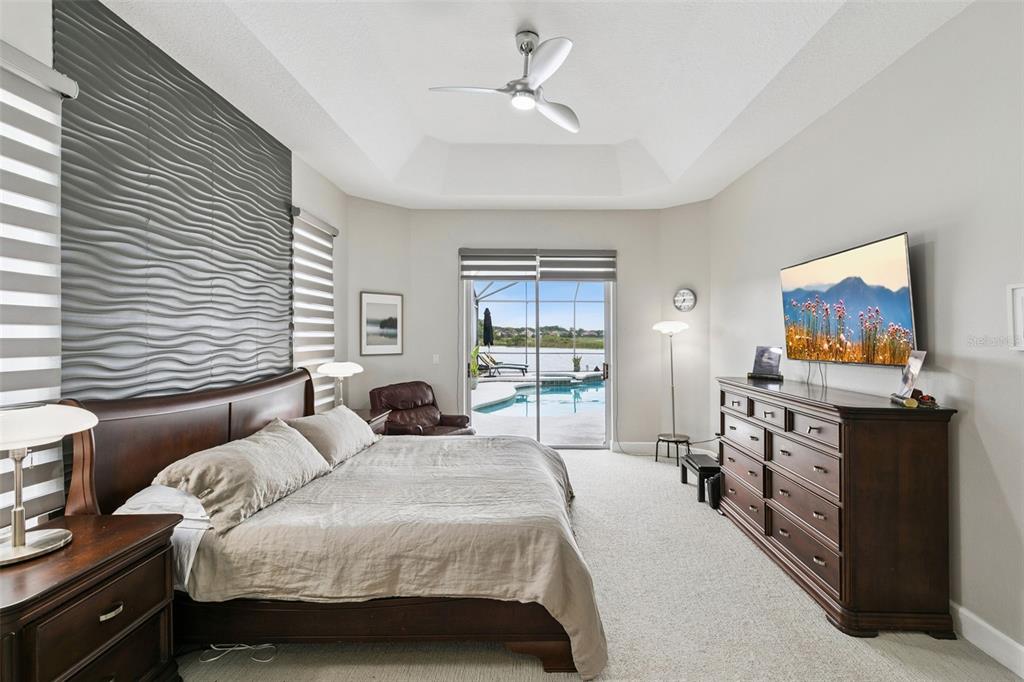 1652 Cherry Ridge Drive Lake Mary, FL 32746 - Photo 21 of 62 a bedroom with a bed and a flat screen tv