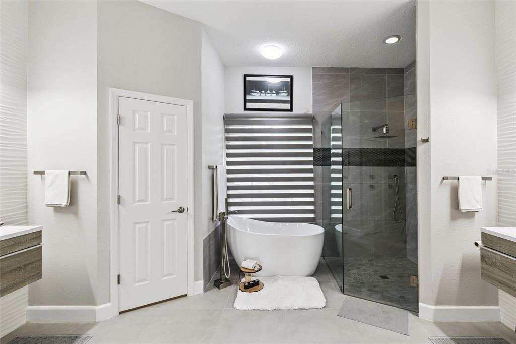 1652 Cherry Ridge Drive Lake Mary, FL 32746 - Photo 25 of 62 a bathroom with a toilet and a shower