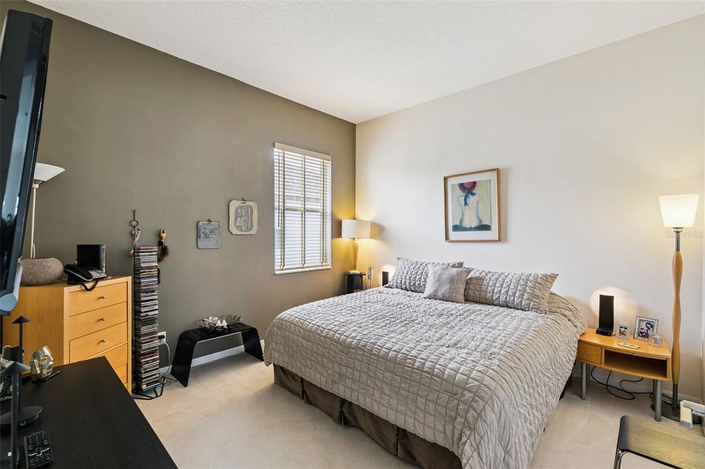 1652 Cherry Ridge Drive Lake Mary, FL 32746 - Photo 26 of 62 a bedroom with a bed and a window