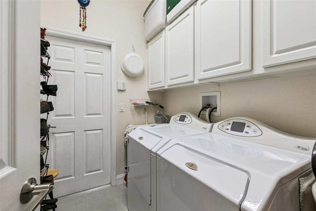 1652 Cherry Ridge Drive Lake Mary, FL 32746 - Photo 32 of 62 a utility room with sink dryer and washer