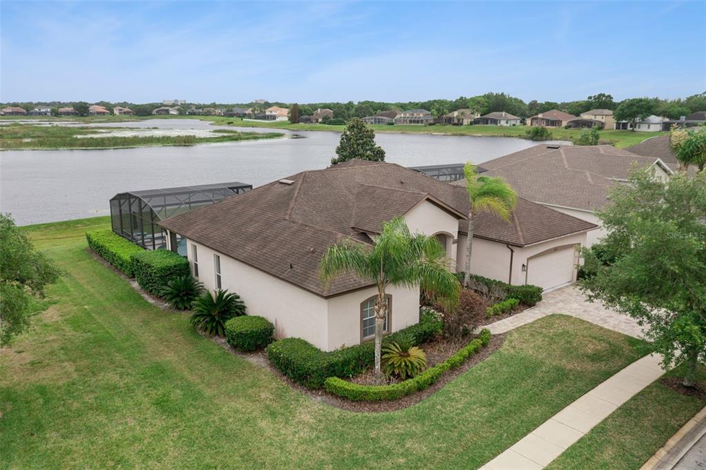 1652 Cherry Ridge Drive Lake Mary, FL 32746 - Photo 43 of 62 an aerial view of a house with a lake view