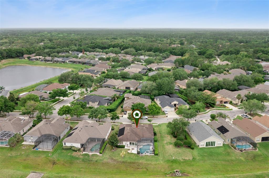 1652 Cherry Ridge Drive Lake Mary, FL 32746 - Photo 48 of 62 an aerial view of residential houses with outdoor space and lake view