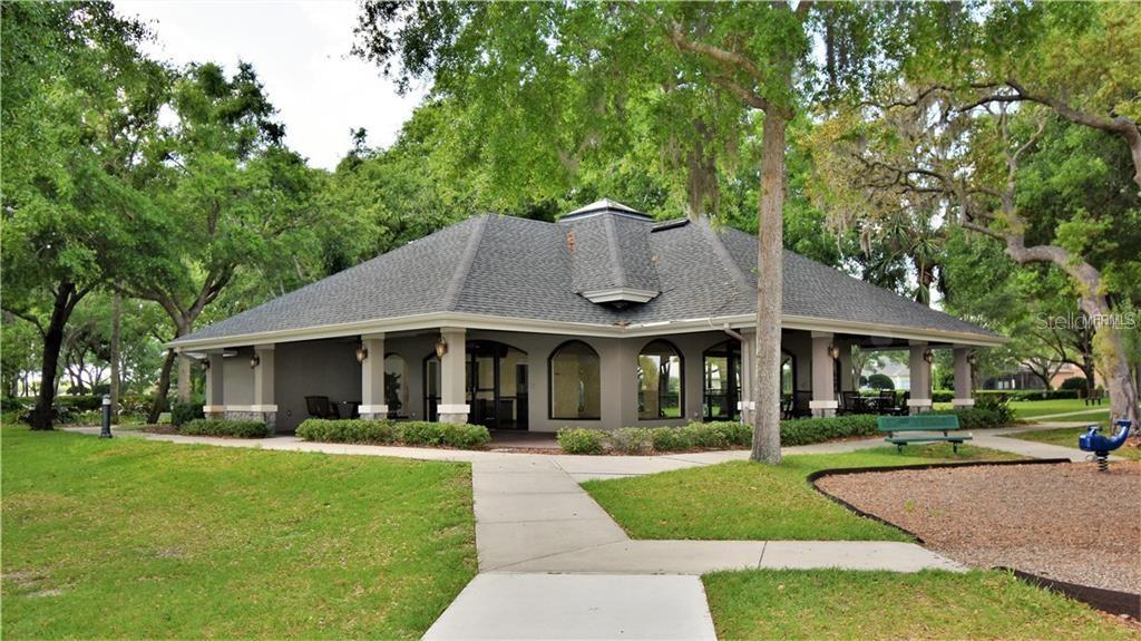 1652 Cherry Ridge Drive Lake Mary, FL 32746 - Photo 58 of 62 a front view of a house with a yard