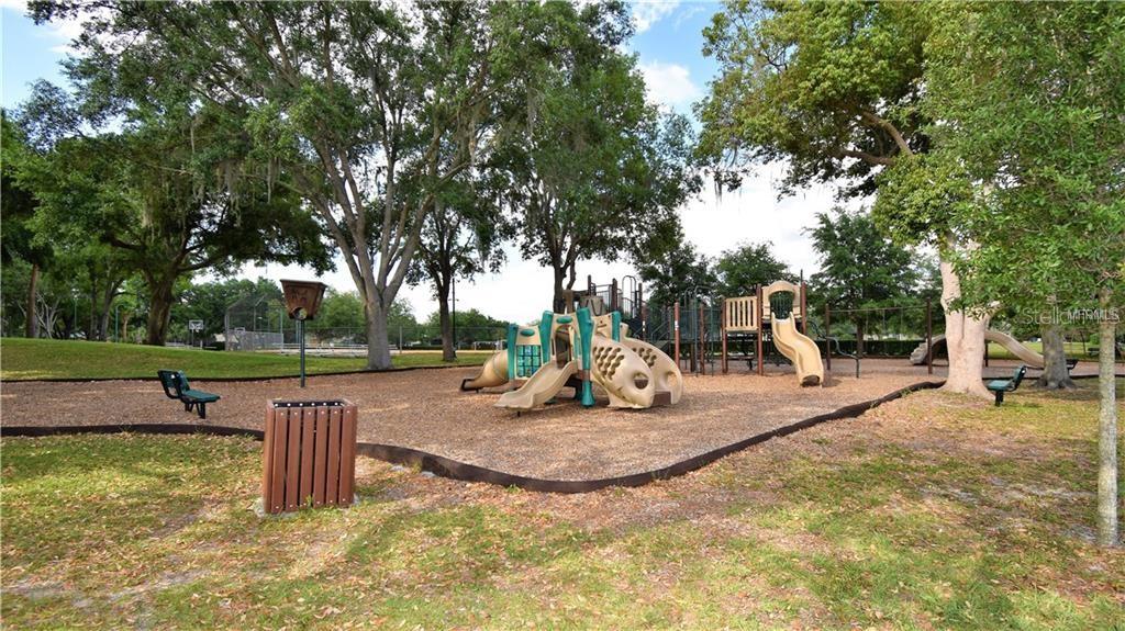 1652 Cherry Ridge Drive Lake Mary, FL 32746 - Photo 60 of 62 a view of a swimming pool with a sitting space